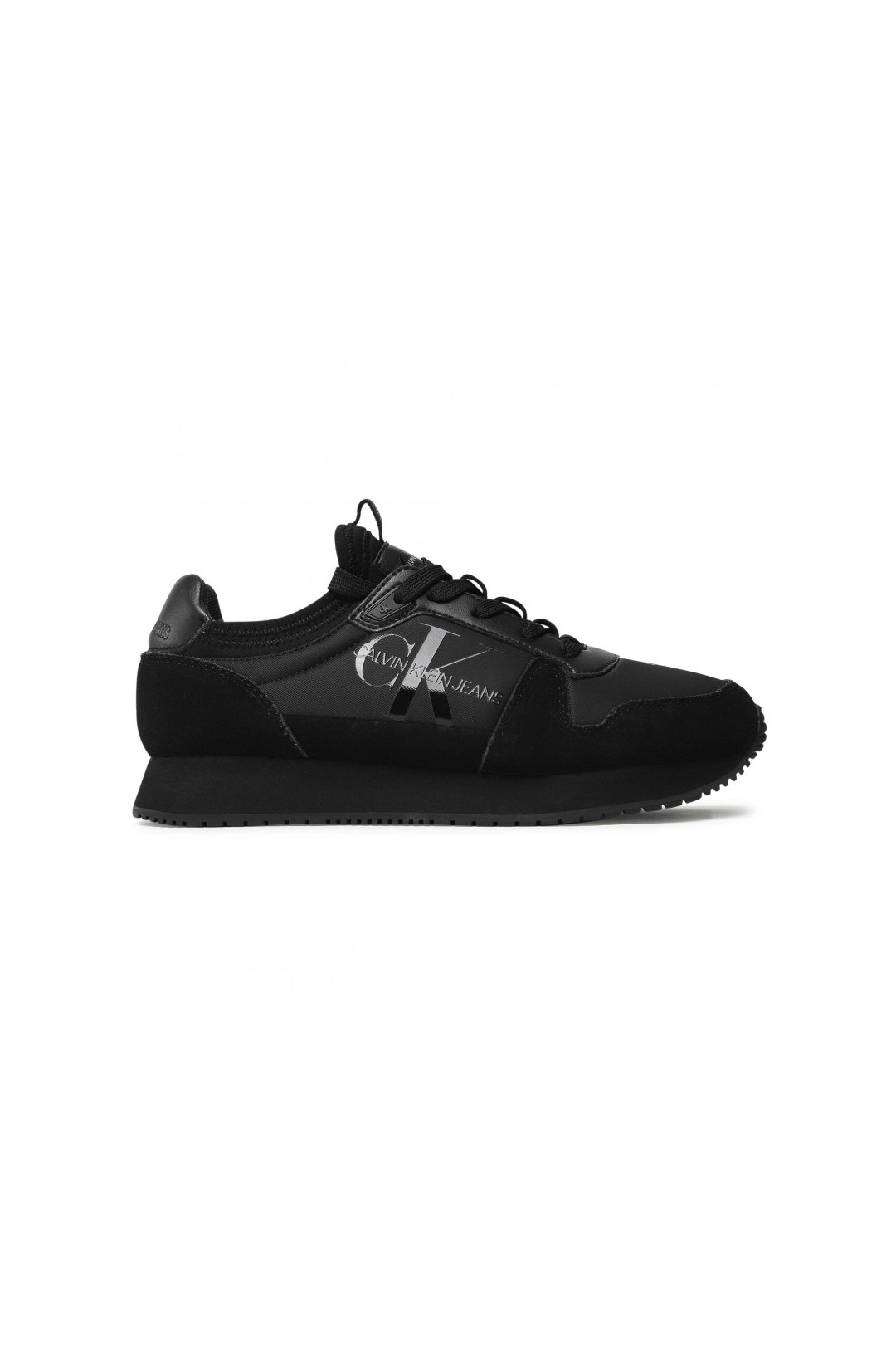 Chaussure mixte sneakers Calvin Klein de couleur noir en daim et simili cuir. YM0YM00040 FIESTA CONCEPT STORE