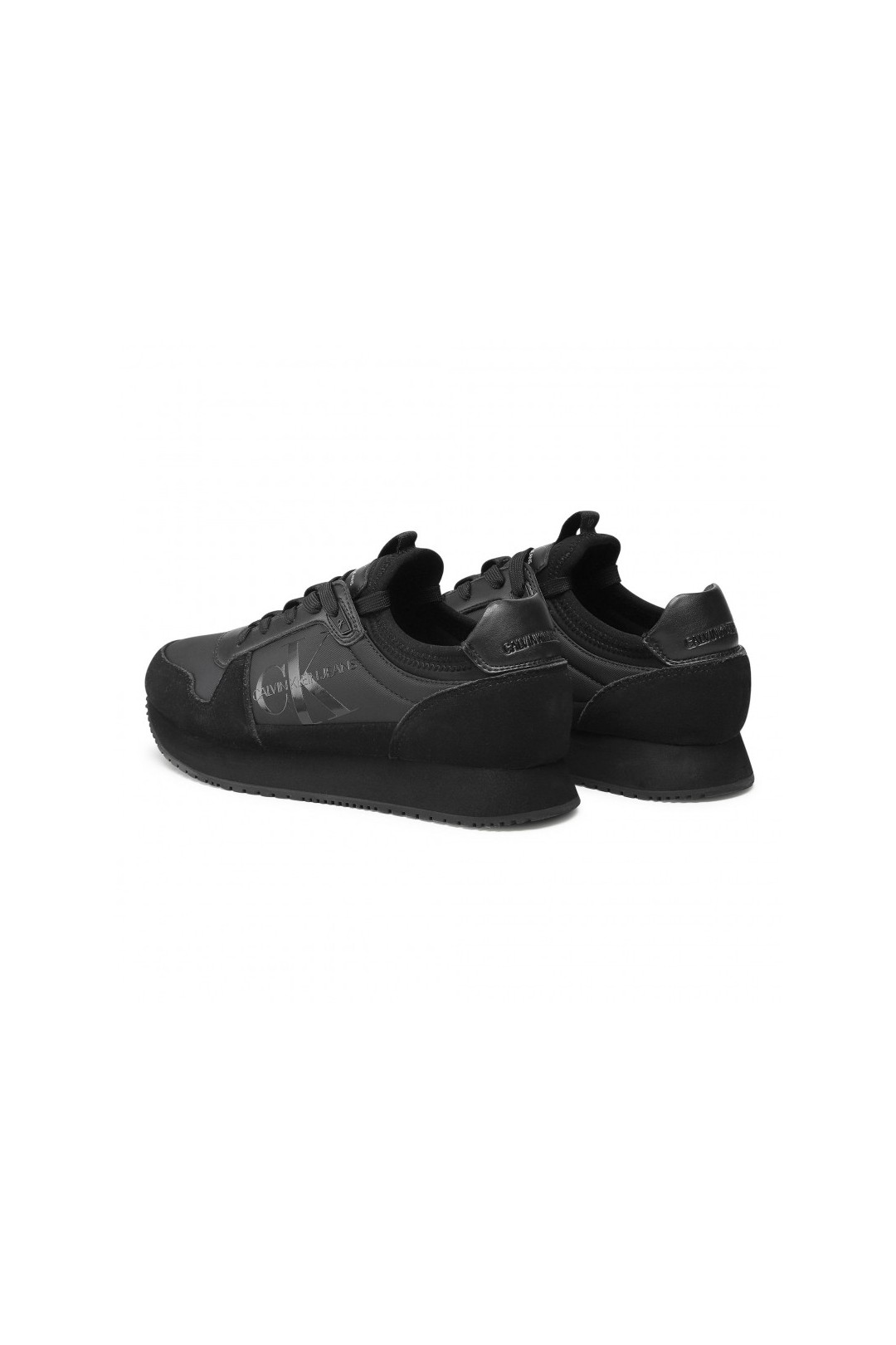 Chaussure mixte sneakers Calvin Klein de couleur noir en daim et simili cuir. YM0YM00040 FIESTA CONCEPT STORE