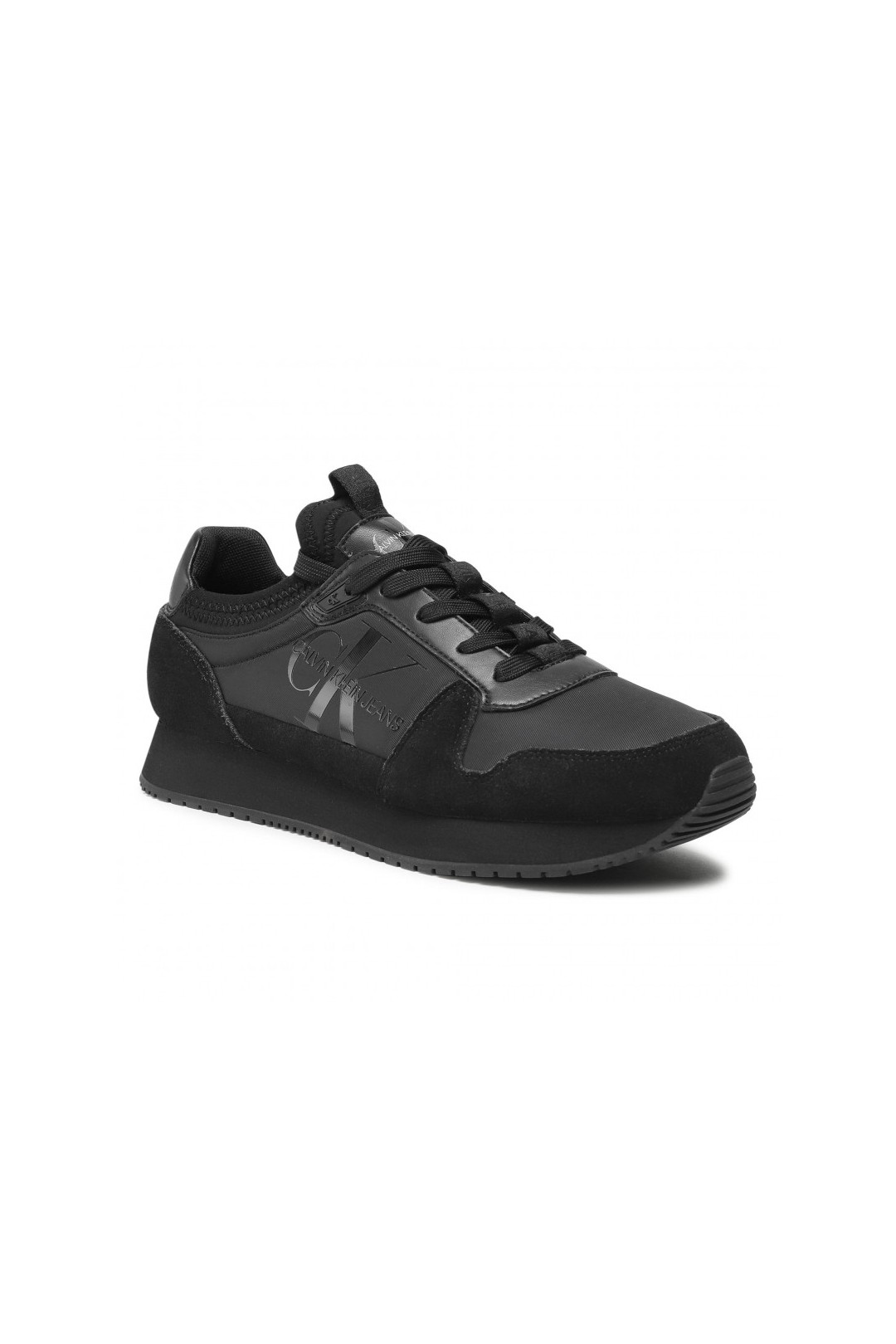 Chaussure mixte sneakers Calvin Klein de couleur noir en daim et simili cuir. YM0YM00040 FIESTA CONCEPT STORE